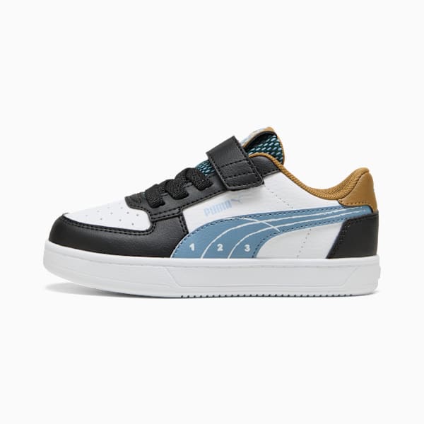 Black and white PUMA trainer, child size, with light blue details and hook-and-loop strap.