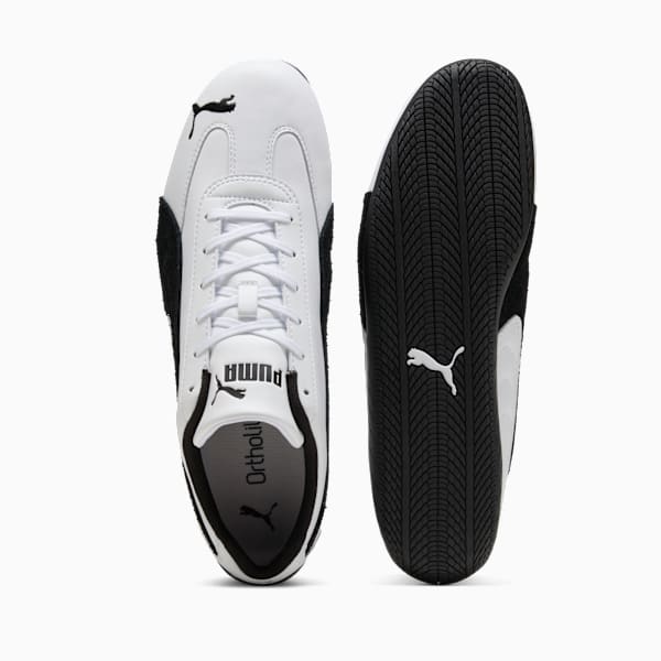 White PUMA mens shoe with a lace-up design and black sole.