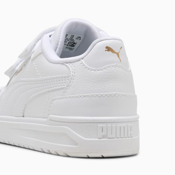 White PUMA trainer for kids with touch-fastening straps and the brand's logo.