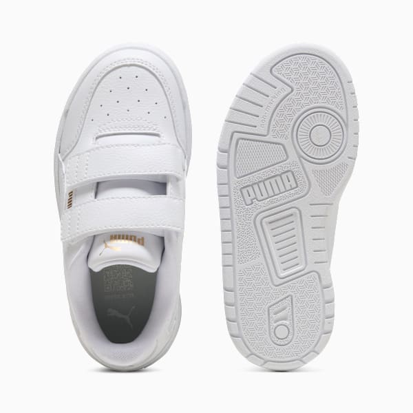 White PUMA trainer (child) with two hook-and-loop straps and a textured rubber sole.