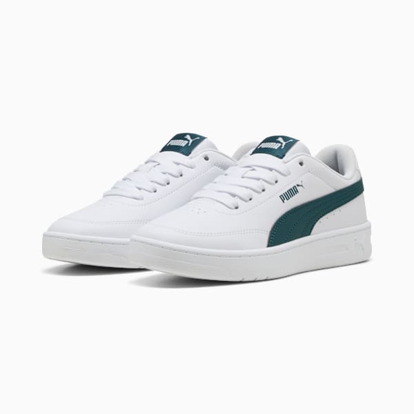 White PUMA trainers with a dark green stripe and lace-up fastening.