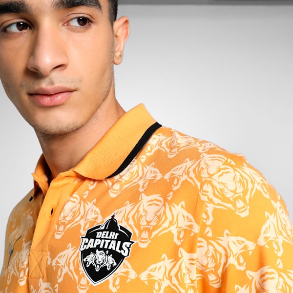 PUMA x DC Men's Printed Slim Fit Cricket Polo, Clementine-Peach Fizz-Club Navy, extralarge-IND