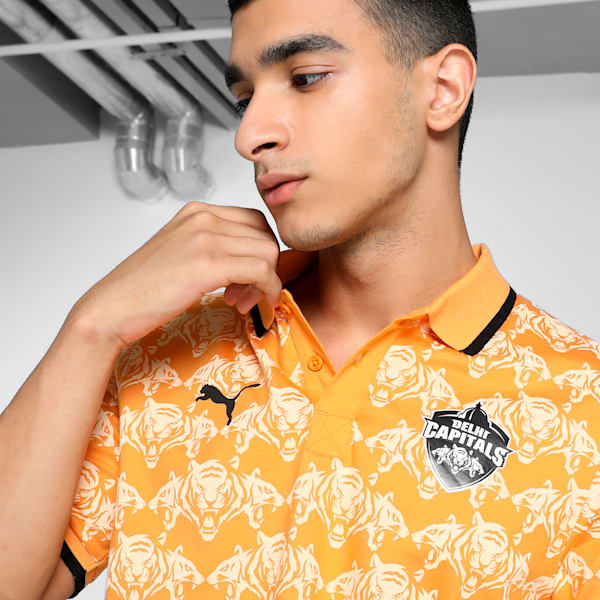 PUMA x DC Men's Printed Slim Fit Cricket Polo, Clementine-Peach Fizz-Club Navy, extralarge-IND