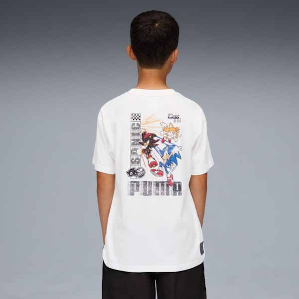 Against grey, a child models a white tee with Sonic characters and the PUMA logo.