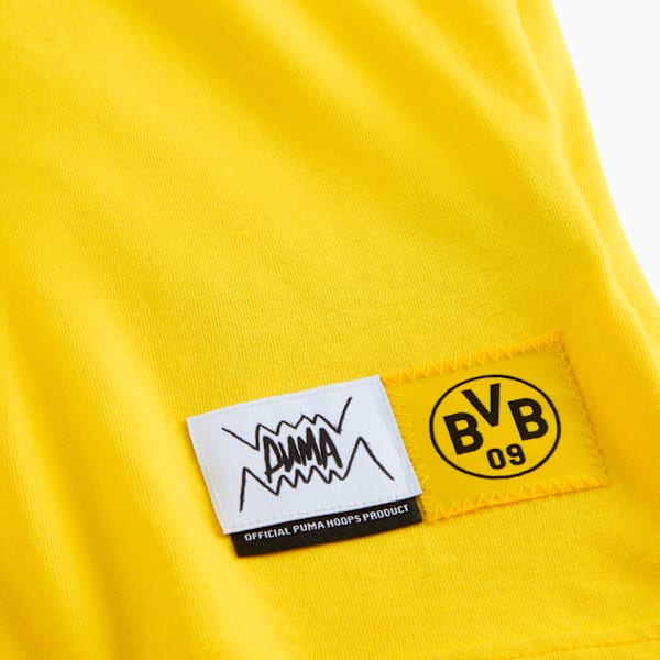 Yellow PUMA T-shirt featuring a BVB logo and a PUMA Hoops product label.