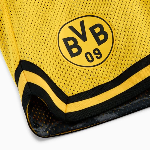 Yellow PUMA shorts, adult size, featuring a BVB 09 badge and black/yellow striped trim.