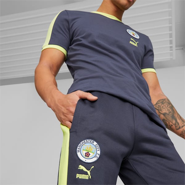 Manchester City F.C. ftblHeritage T7 Track Pants Men, Parisian Night-Fresh Yellow