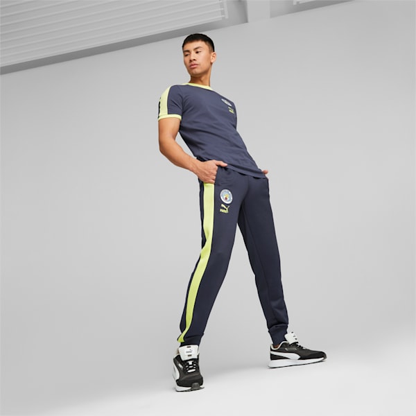 Manchester City F.C. ftblHeritage T7 Track Pants Men, Parisian Night-Fresh Yellow