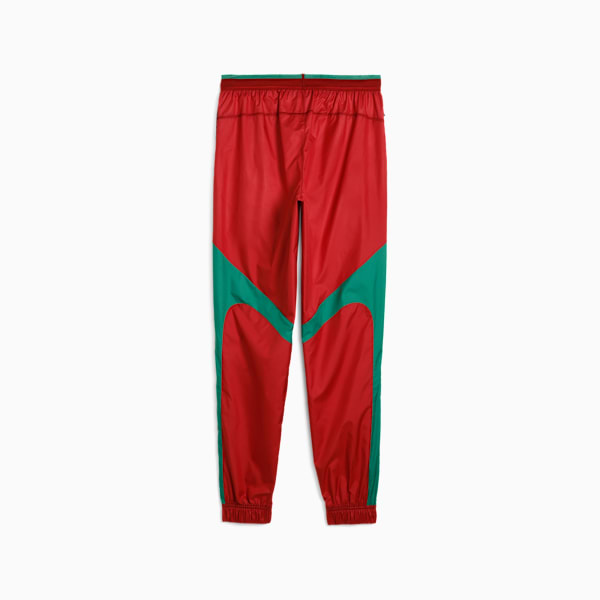 Red PUMA trousers for adults with green panels on the sides of the legs.