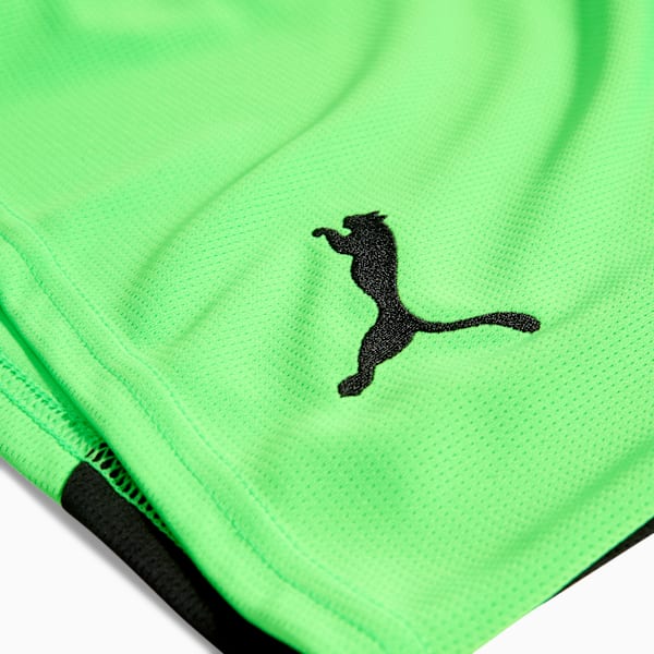 Green PUMA men's shorts with a black logo on the right leg.