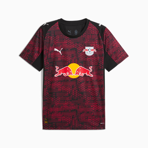 Red PUMA football shirt for youth, featuring team logos and patterned design.