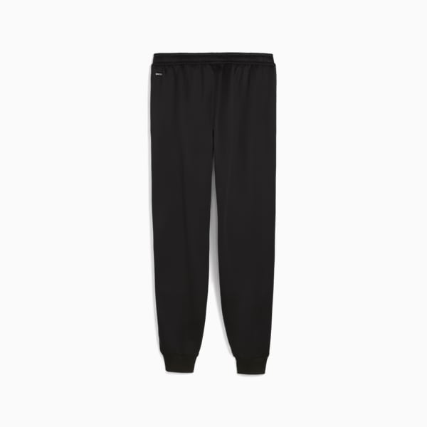 Black PUMA training trousers for adults with a DRYCELL logo and elasticated cuffs.