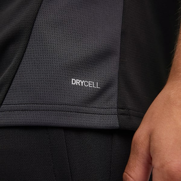 Close-up of a black and grey shirt with the word DRYCELL on the left side.