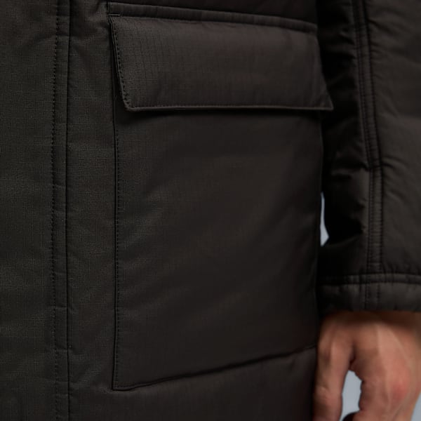 Close-up of a dark brown coat with a pocket, set against a muted background.
