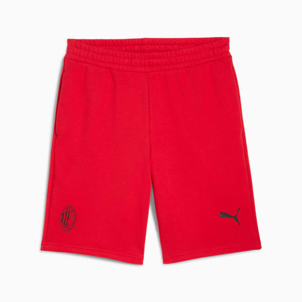Red PUMA youth shorts with a logo and an emblem on the left leg.