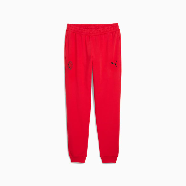 Red PUMA tracksuit bottoms for kids with logo and emblem detail.