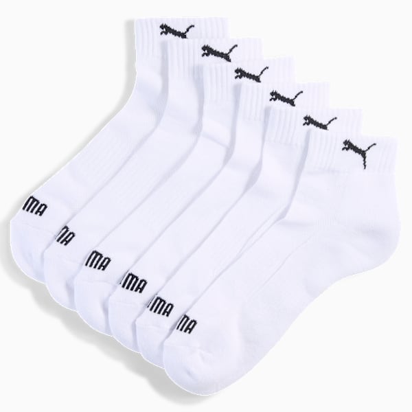 White PUMA ankle socks show the brand's logo in black.