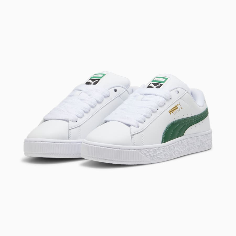This is the puma suede XL sneaker with a green from strip