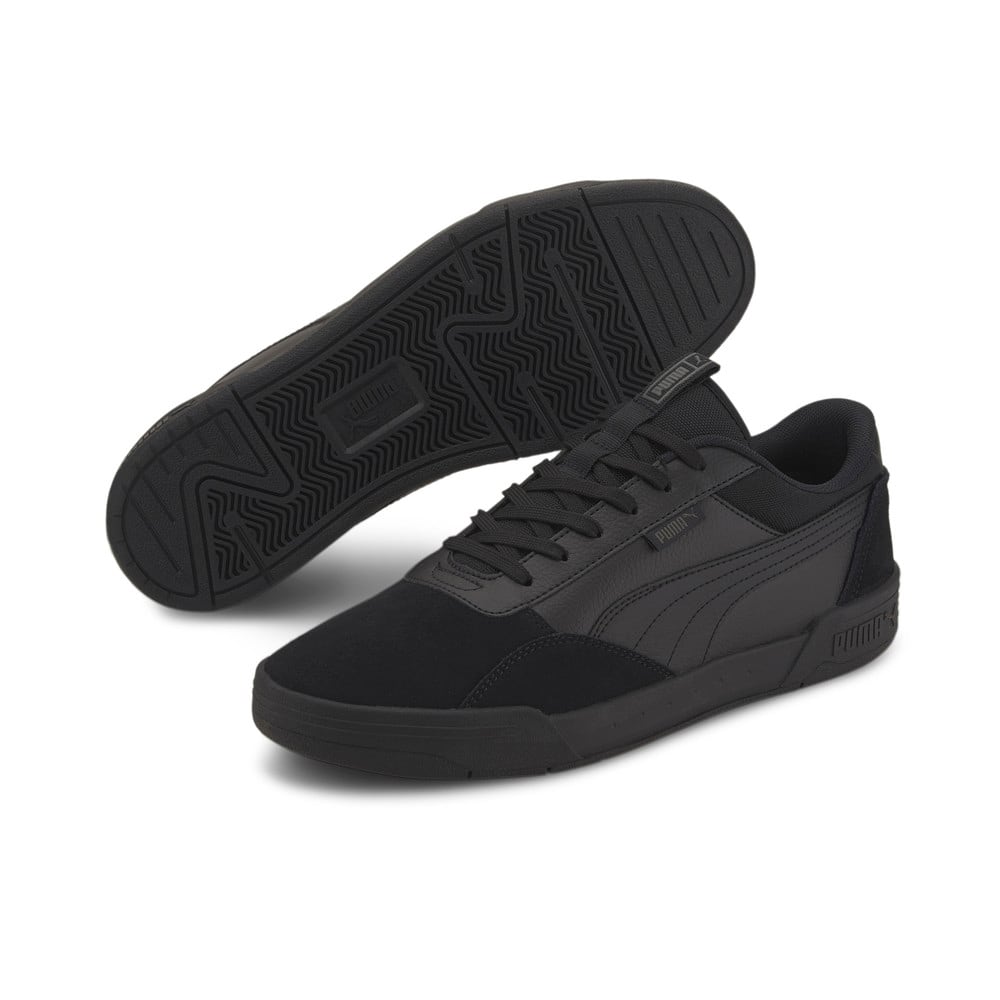 black and beige trainers