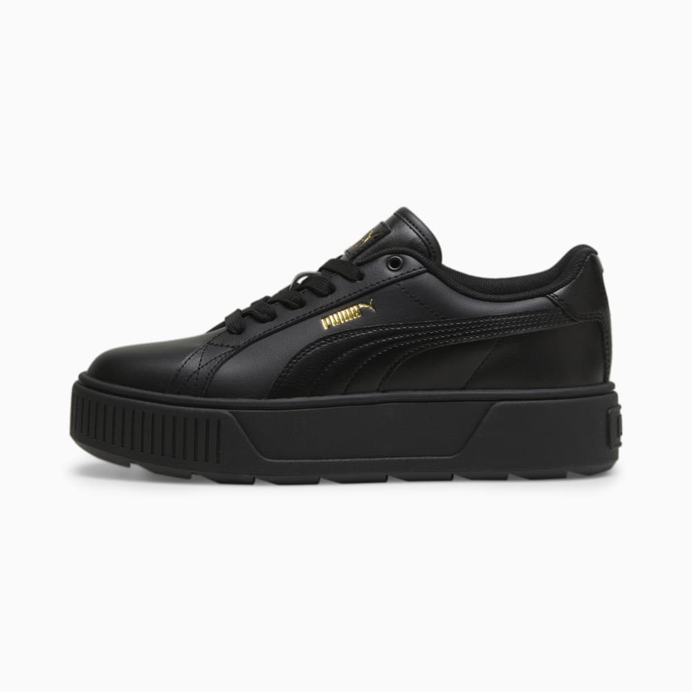 Puma black gold trainers top