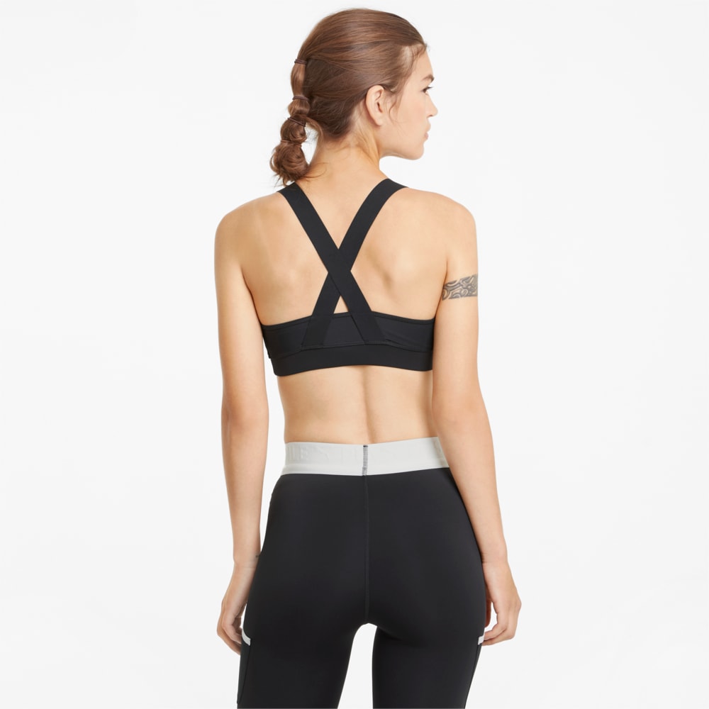 Buy Puma Women's x FIRST MILE Mid Impact Padded Sports Bra Black in KSA -SSS