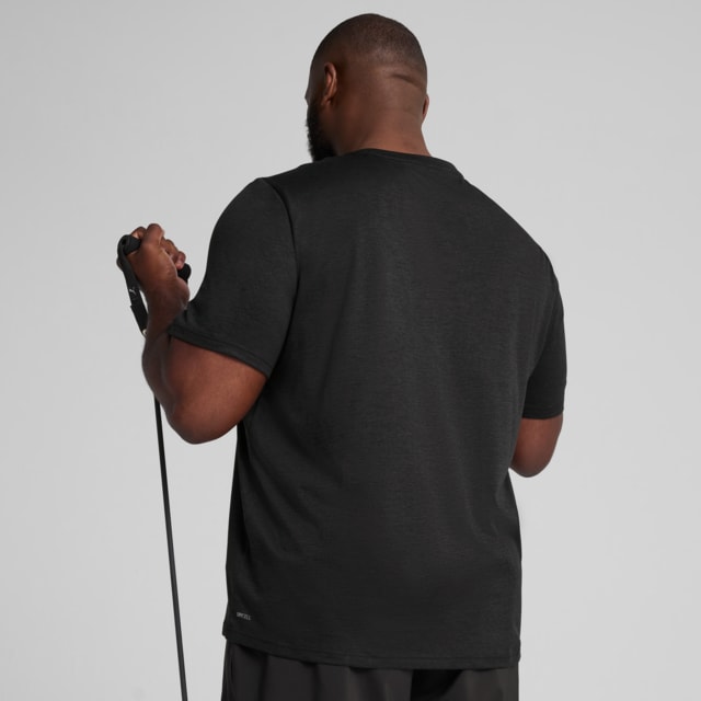 Imagen PUMA Polera Train All Day Essentials Jaspeada para hombre