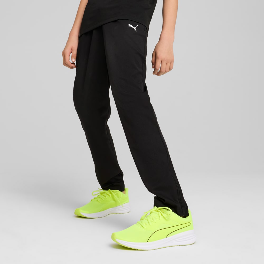 Изображение Puma Детские брюки Train All Day Essentials Woven Tapered Pants Youth #1: Puma Black