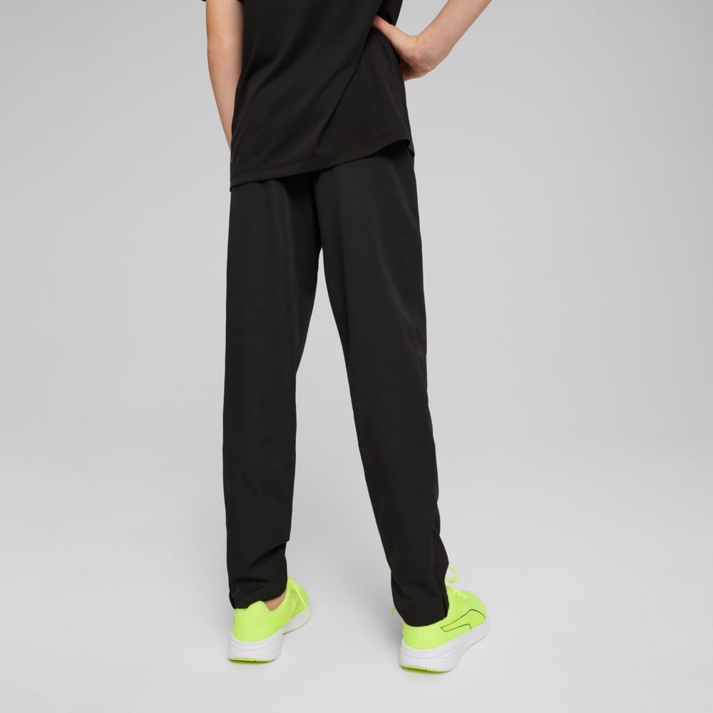 Изображение Puma Детские брюки Train All Day Essentials Woven Tapered Pants Youth #2: Puma Black