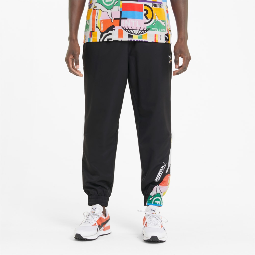 Изображение Puma Штаны PUMA International Woven Men's Track Pants #1: Puma Black