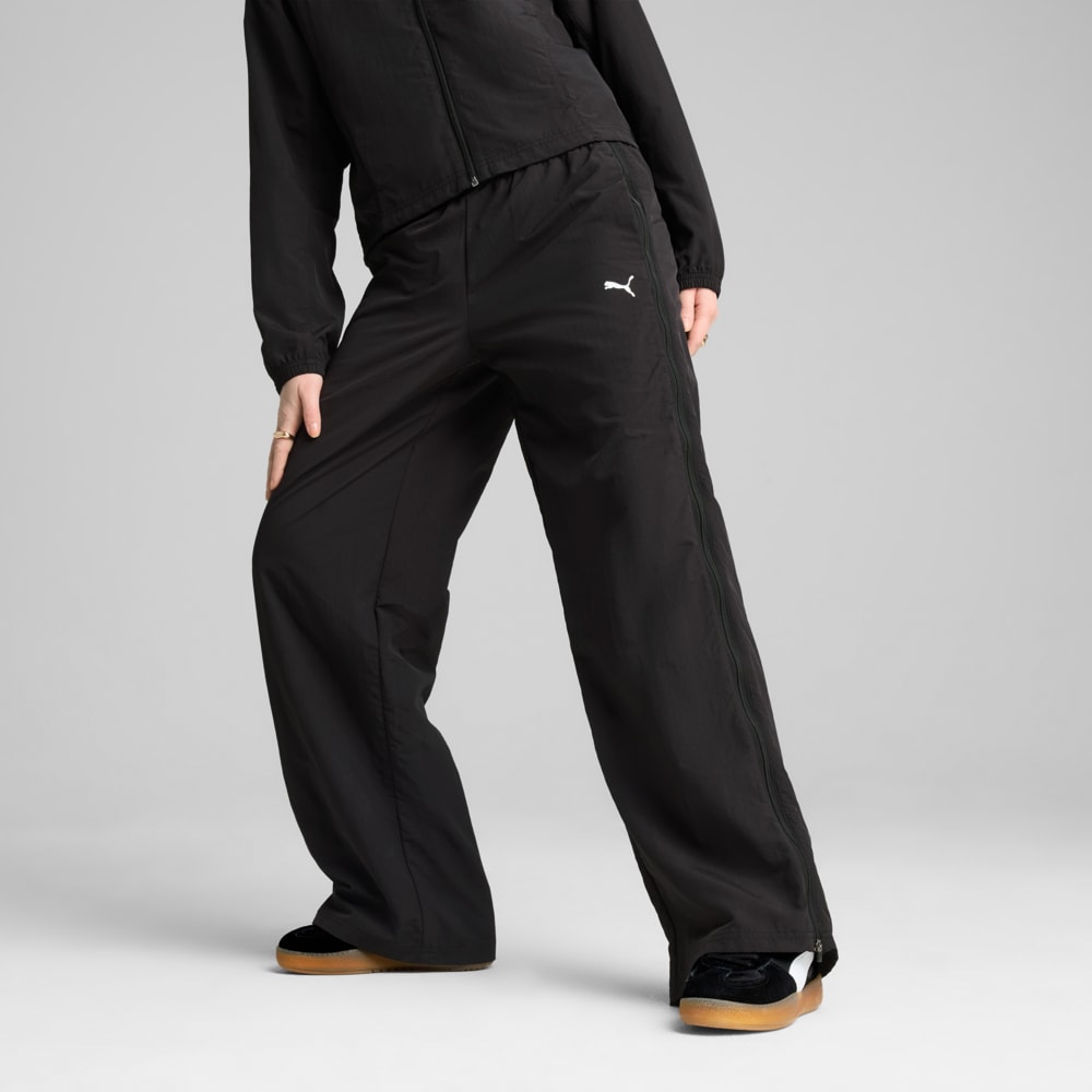 Image PUMA Calça DARE TO Relaxed Woven Zip-Off Feminina #1