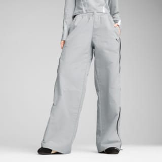 Изображение Puma Брюки DARE TO Relaxed Woven Zip-Off Pants Women