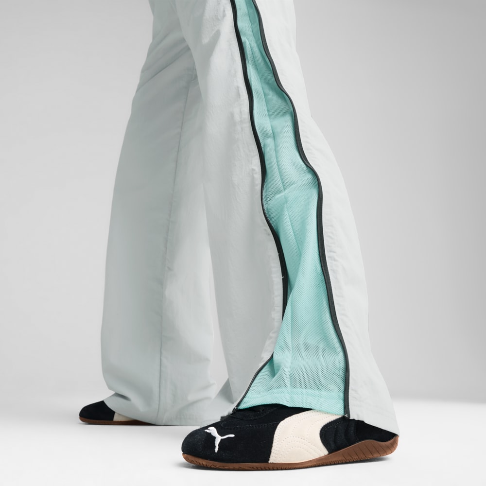 Изображение Puma Брюки DARE TO Relaxed Woven Zip-Off Pants Women #2: Flat Light Gray