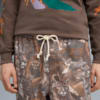 Imagen PUMA Pantalones Special Items con estampado integral para hombre #2