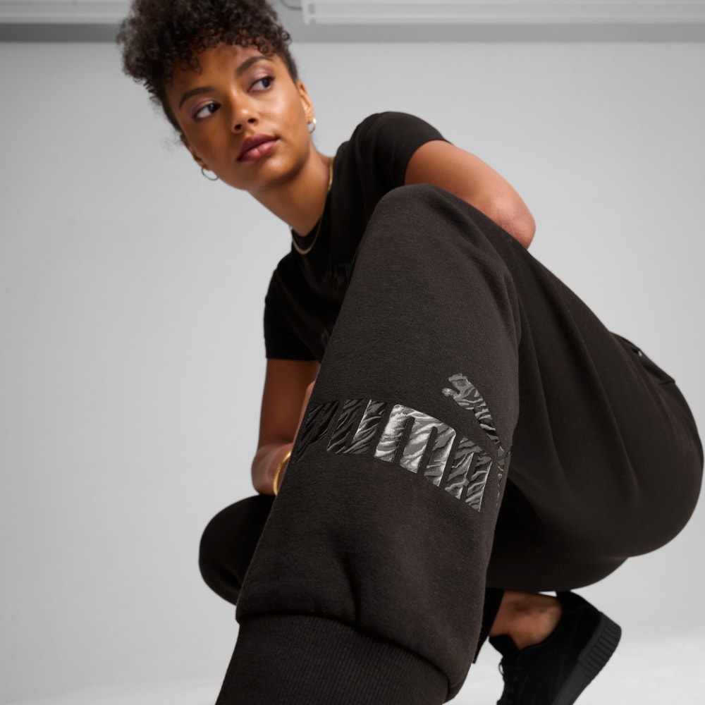 Зображення Puma Штани ESS+ ANIMAL Pants Women #2: Puma Black