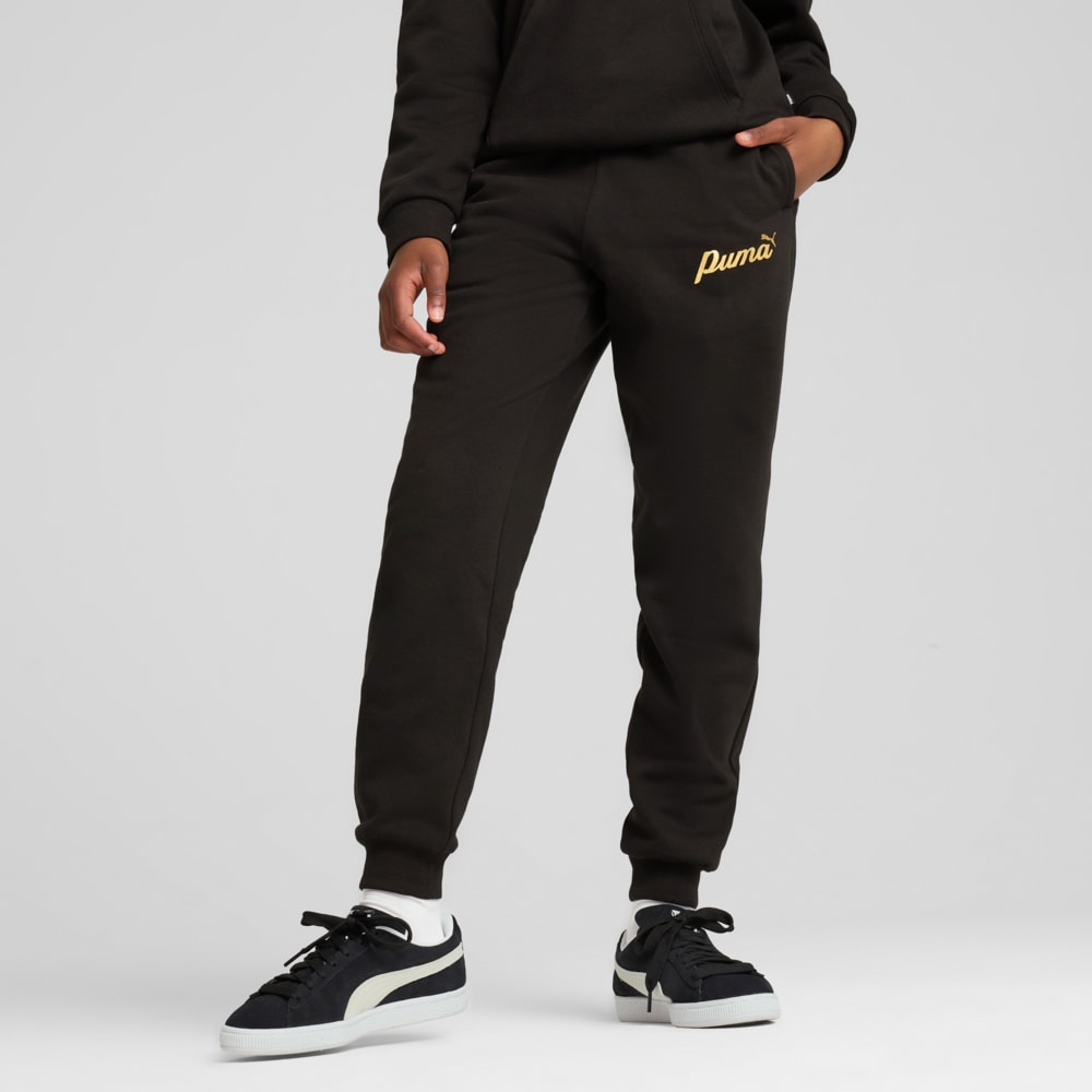 Изображение Puma Детские брюки ESS+ SCRIPT Pants Youth #1: Puma Black-Gold foil