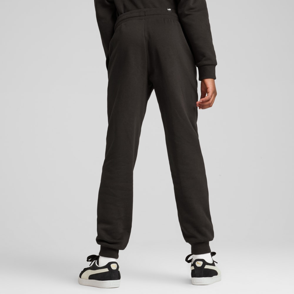 Изображение Puma Детские брюки ESS+ SCRIPT Pants Youth #2: Puma Black-Gold foil