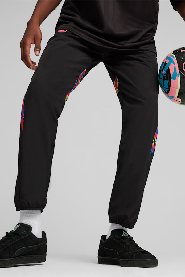 Manchester City FtblNrgy Woven Pants, PUMA Black-Sunset Glow, extralarge