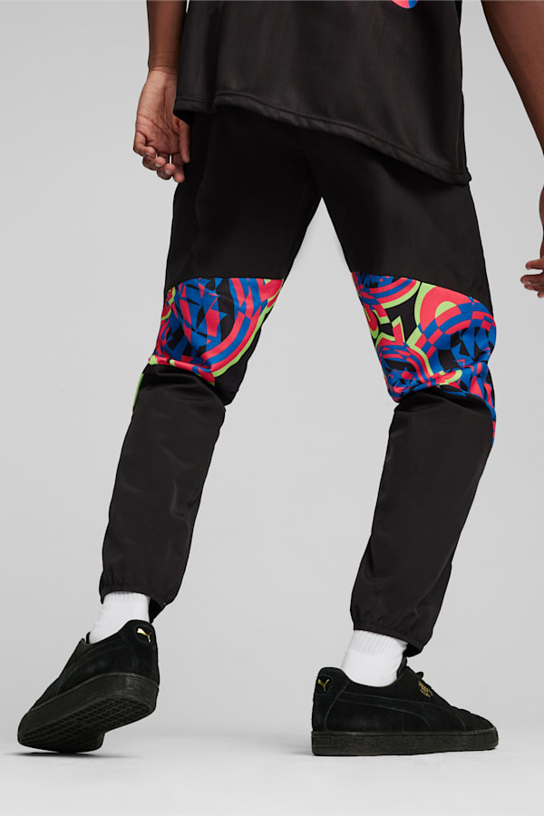 Manchester City FtblNrgy Woven Pants, PUMA Black-Sunset Glow, extralarge