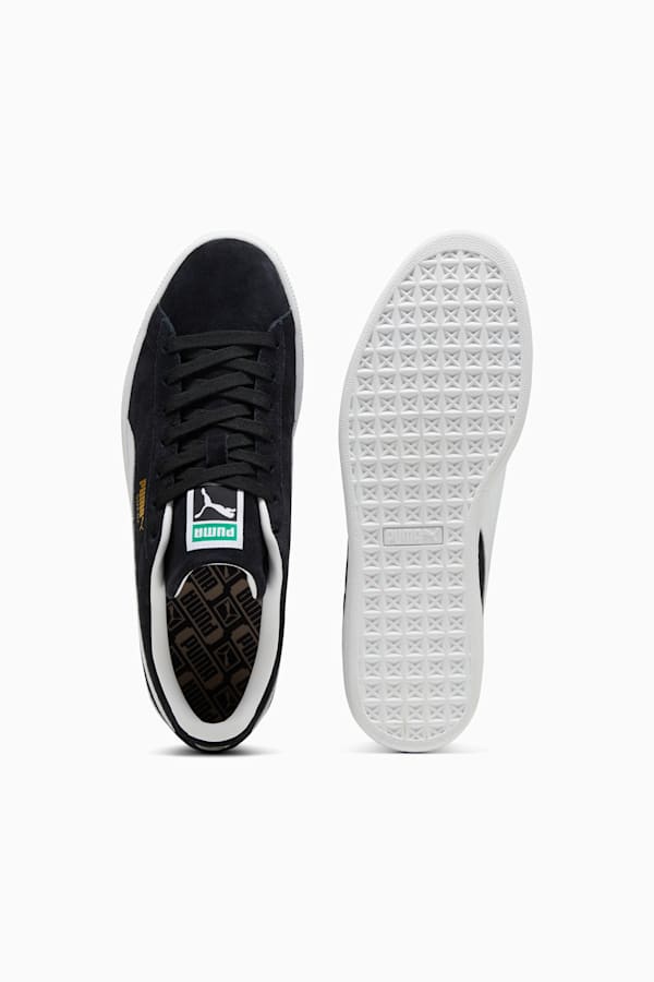 Black and white pumas suede store
