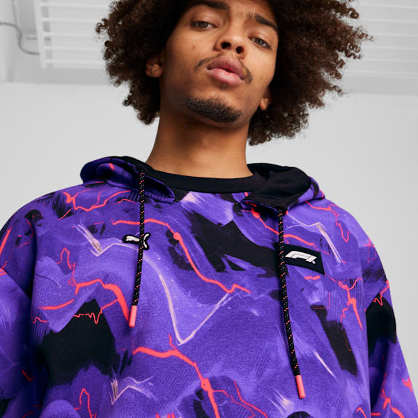 Buzo con capucha F1® Neon Energy con estampado integral para hombre, PUMA Black, large-ARG