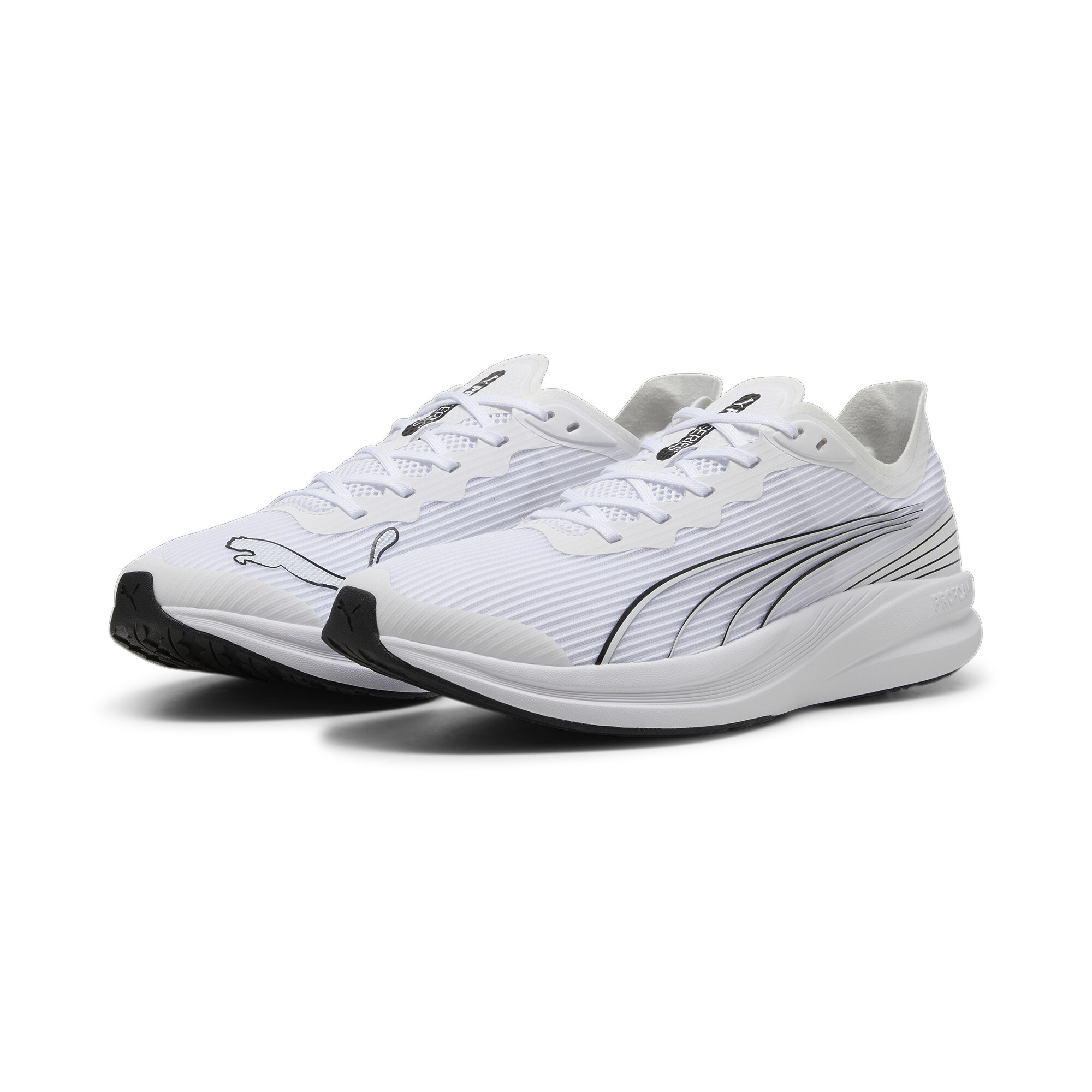 Men's PUMA Redeem Pro Racer Running Shoe In White, Size EU 38