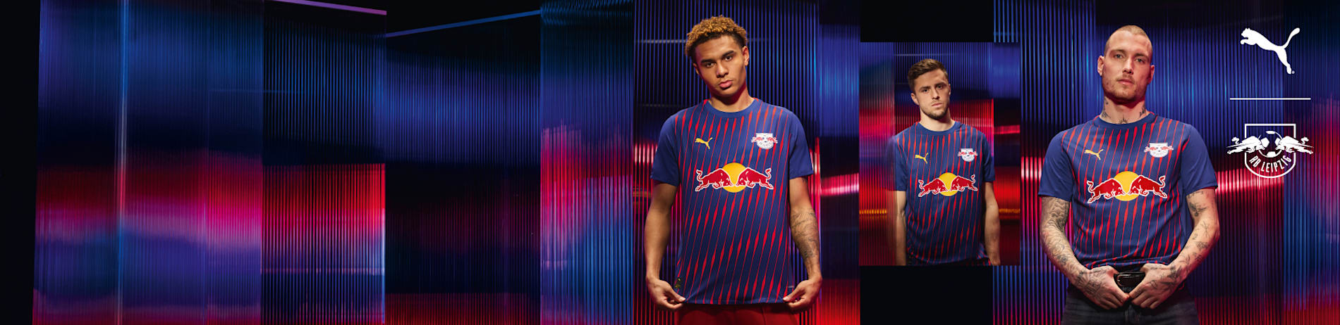 Three players wear RB Leipzig away shirts against a blue and red striped backdrop.