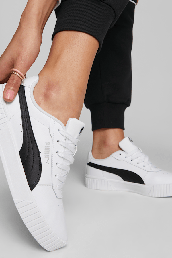 Puma carina leather trainers ladies black hotsell
