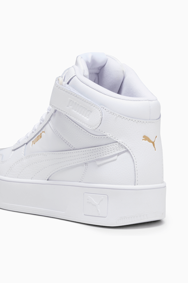 Puma Cali Sport Hi-top sneakers in white and black